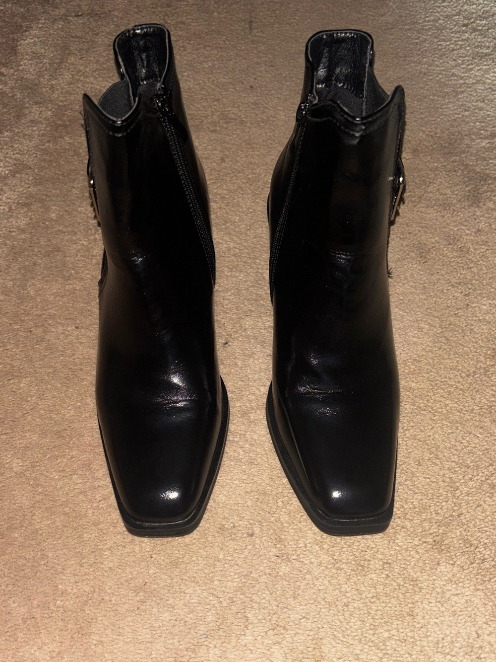 Women’s black leather ankle boots with a 3”heel